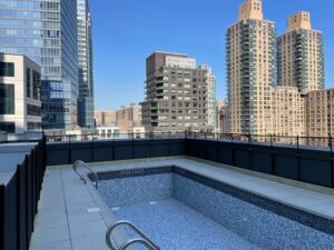 NYC rooftop swimming pool fence