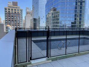 rooftop pool fence with self-closing gate NYC